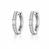 Pair of silver hoop earrings with clear gemstones on a white background