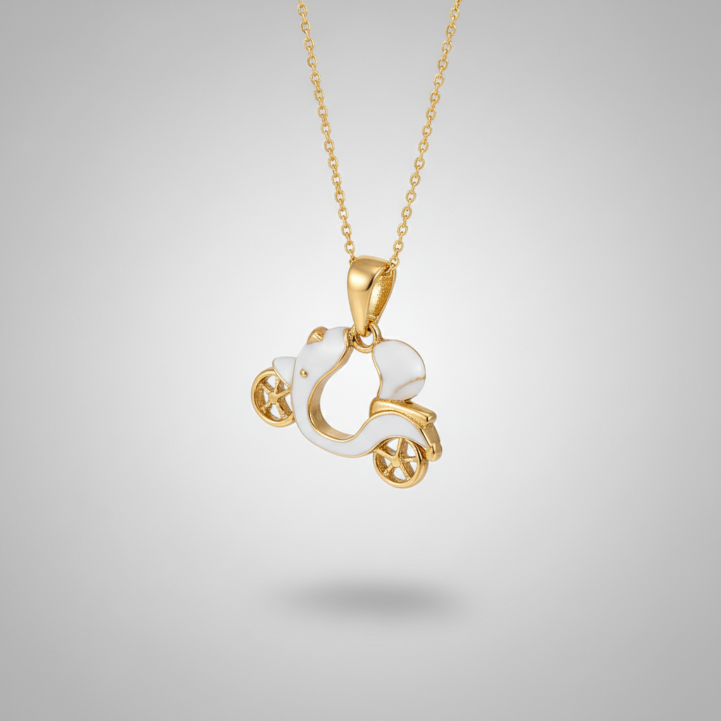 Gold necklace with a white pendant shaped like a horse in a carriage on a white fabric background